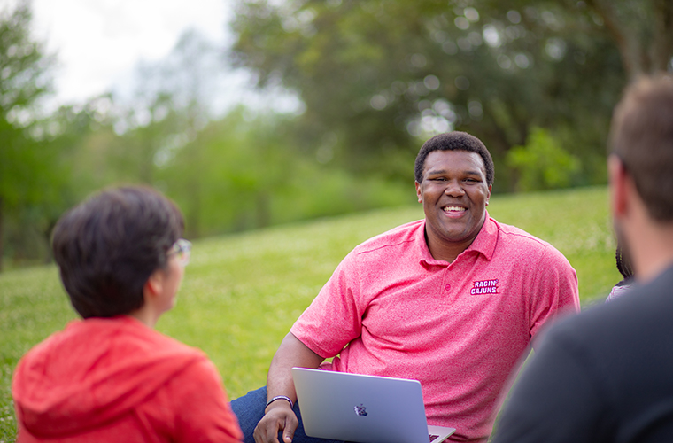 students studying together outside