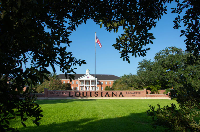 The University of Louisiana brick welcome wall in front of campus
